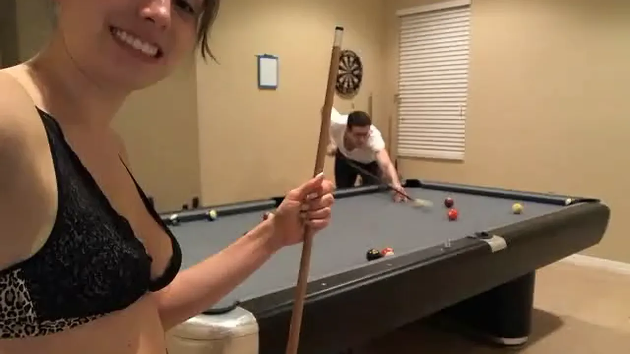 Brunette webcam model plays pool in lingerie before taking a bubble bath