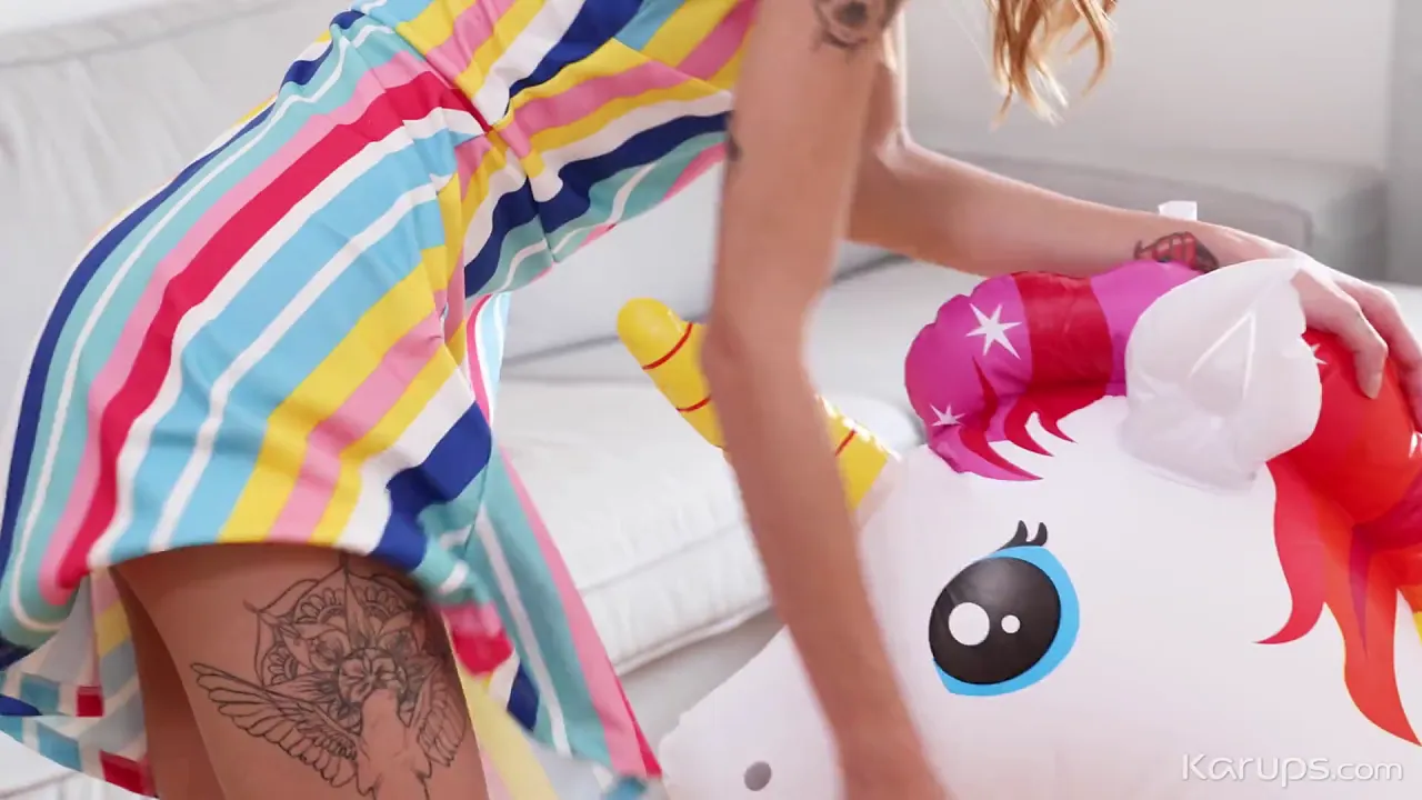 Adelle Unicorn, a blonde solo female with small tits, masturbates to orgasm using her