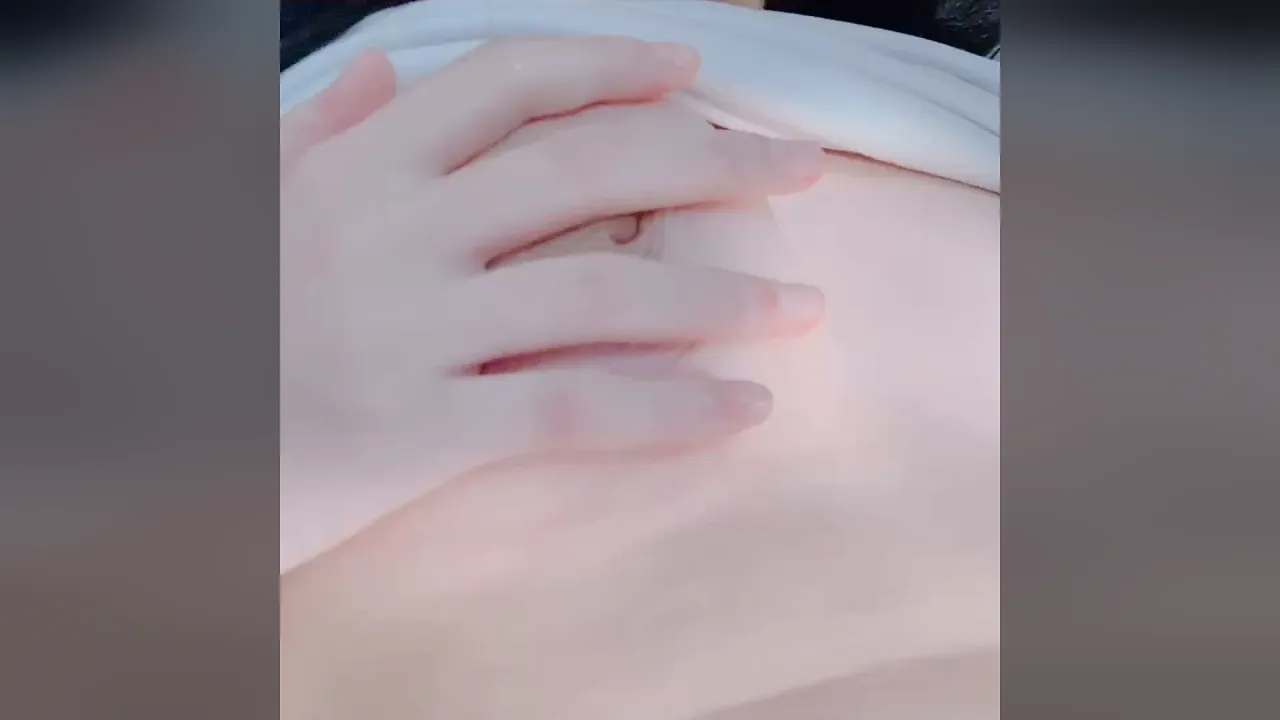 Solo Asian girl masturbates and cums on camera