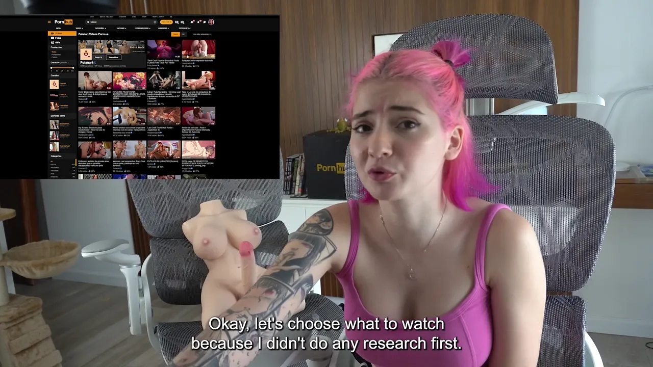 Emma Fiore reacts to futanari porn with huge tits and giant cocks on webcam