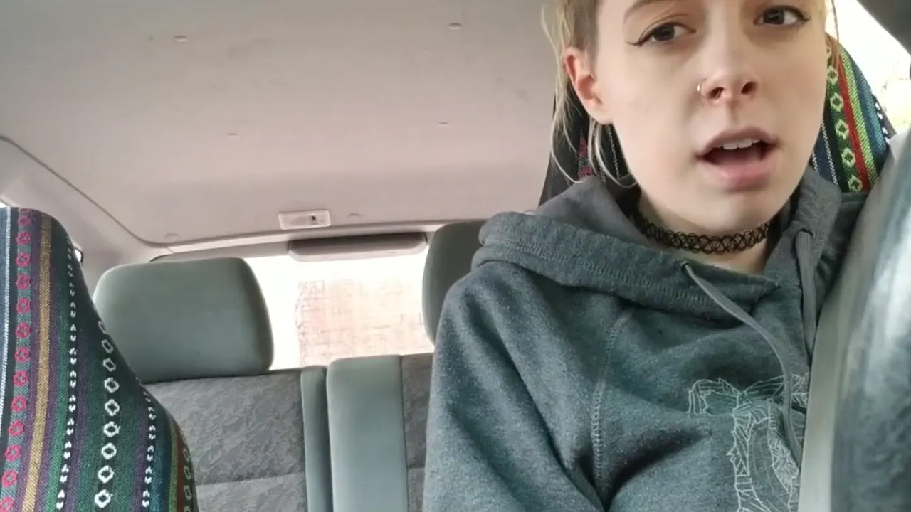 Young blonde masturbates with a vibrator in public while driving