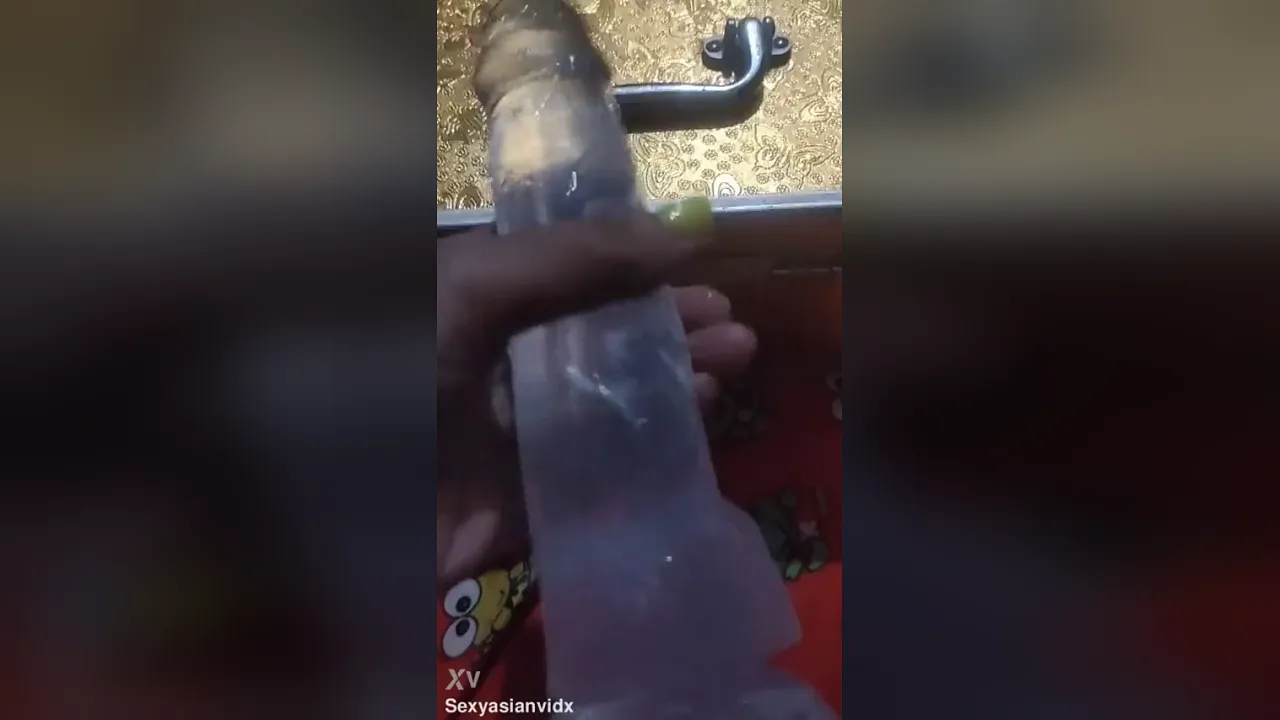 Filipina amateur masturbates with a big transparent dildo in her shaved pussy