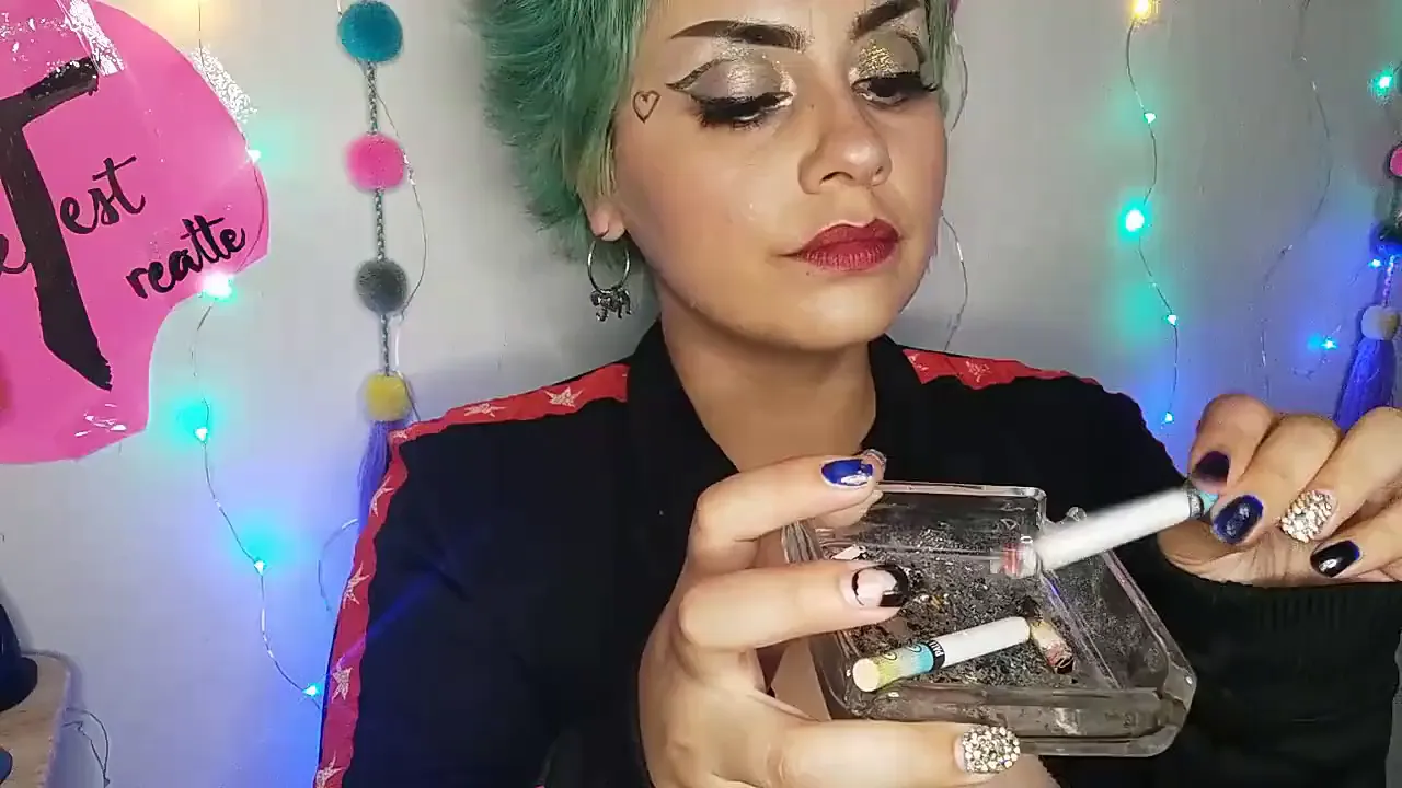 Tattooed Latina MILF smokes and masturbates on webcam