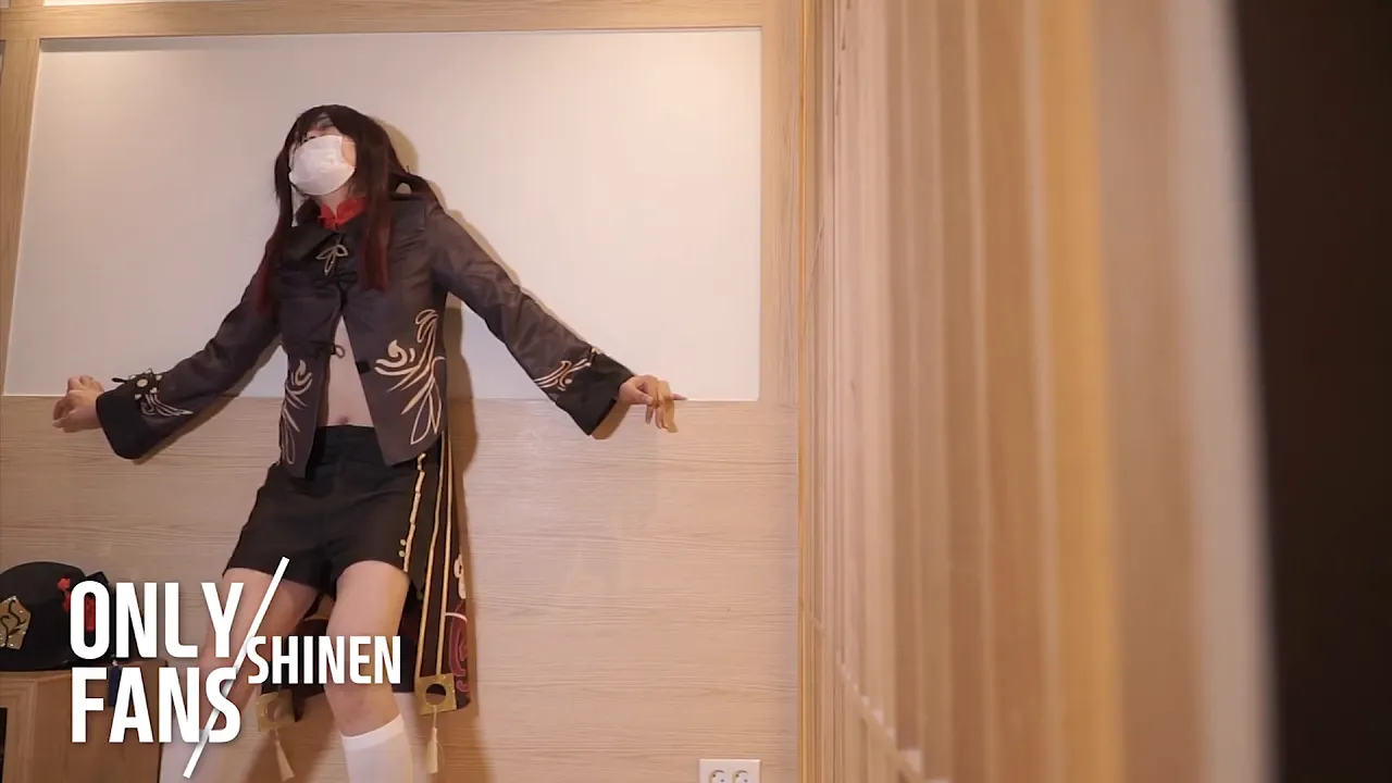 Asian cosplayer masturbates with a vibrator dressed as Genshin Impact character