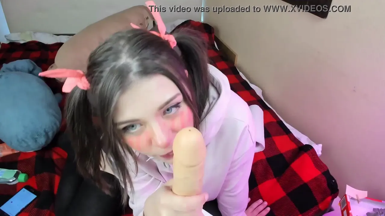 Cute amateur camgirl sucks dildo while masturbating solo