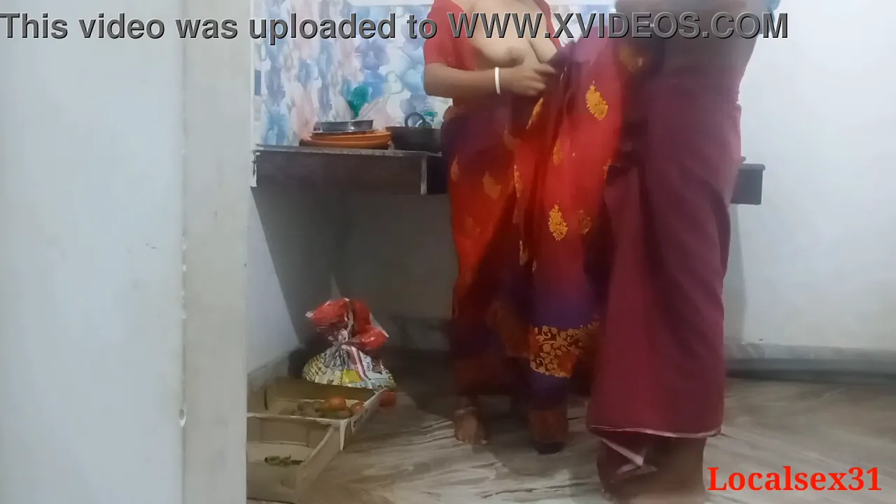 Indian housewife in red saree has kitchen sex with younger man