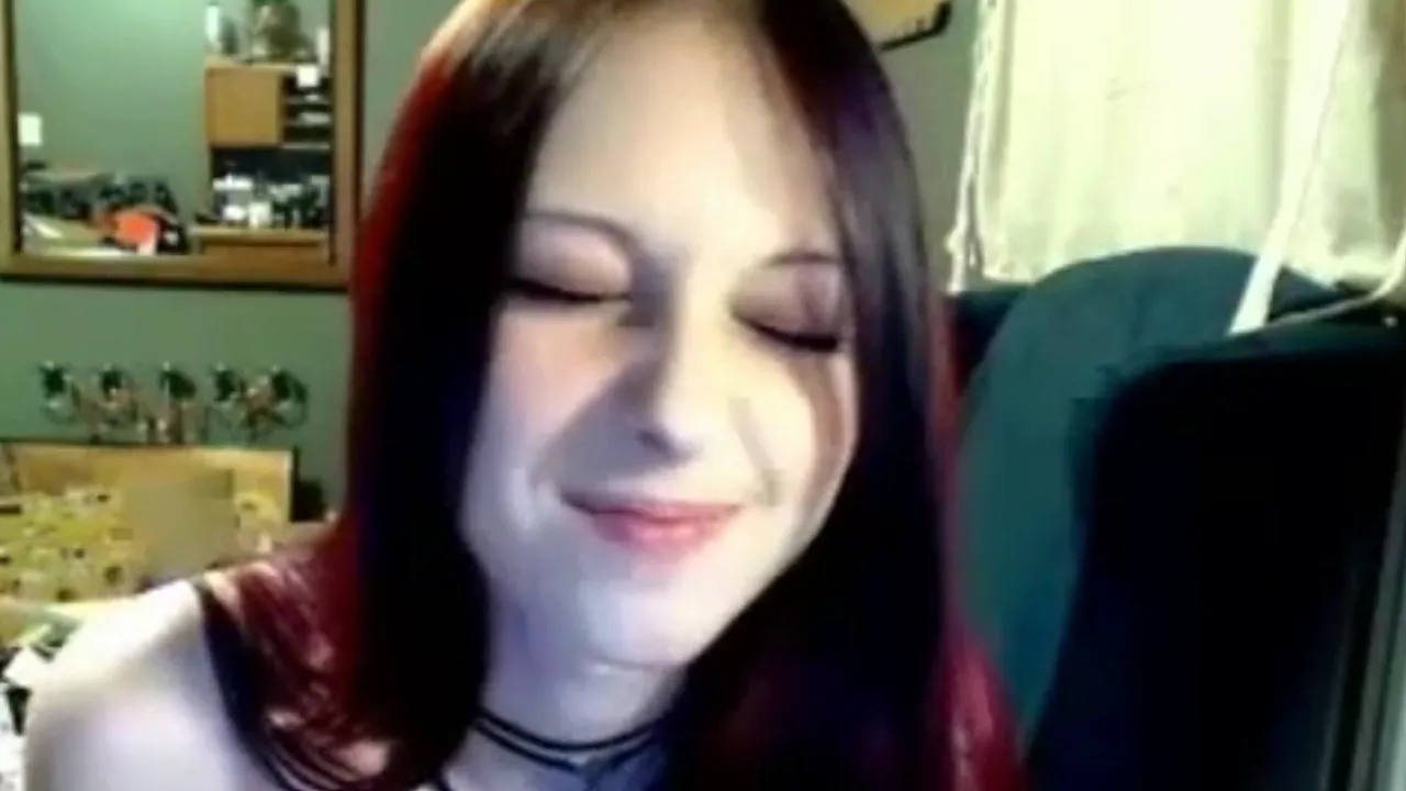 Goth camgirl Liz Vicious masturbates with a big pink dildo on webcam