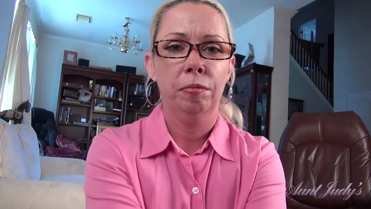 Amateur step-aunt Liz teases her hairy pussy while talking dirty to her step-nephew in