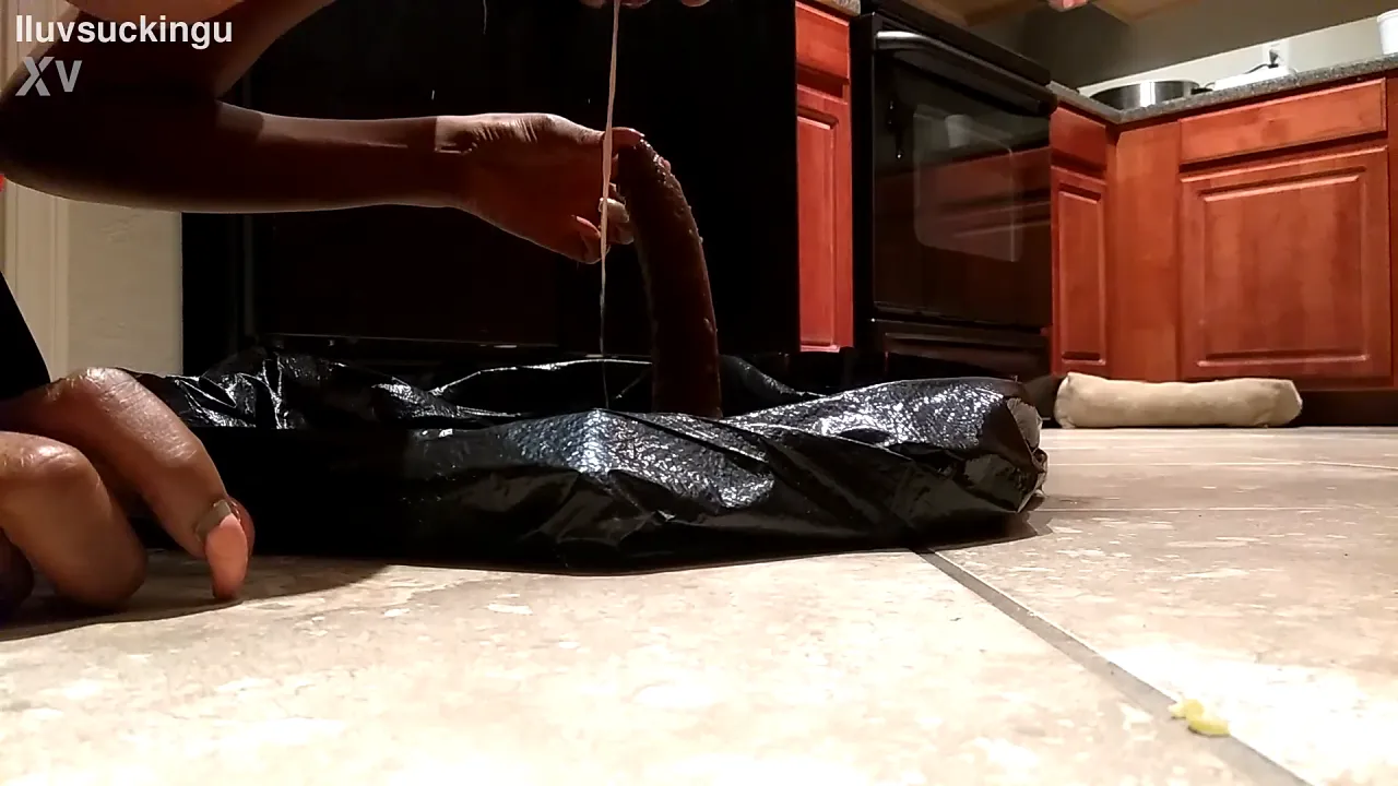Ebony slut gags on dildo while puking and spitting up in her pussy