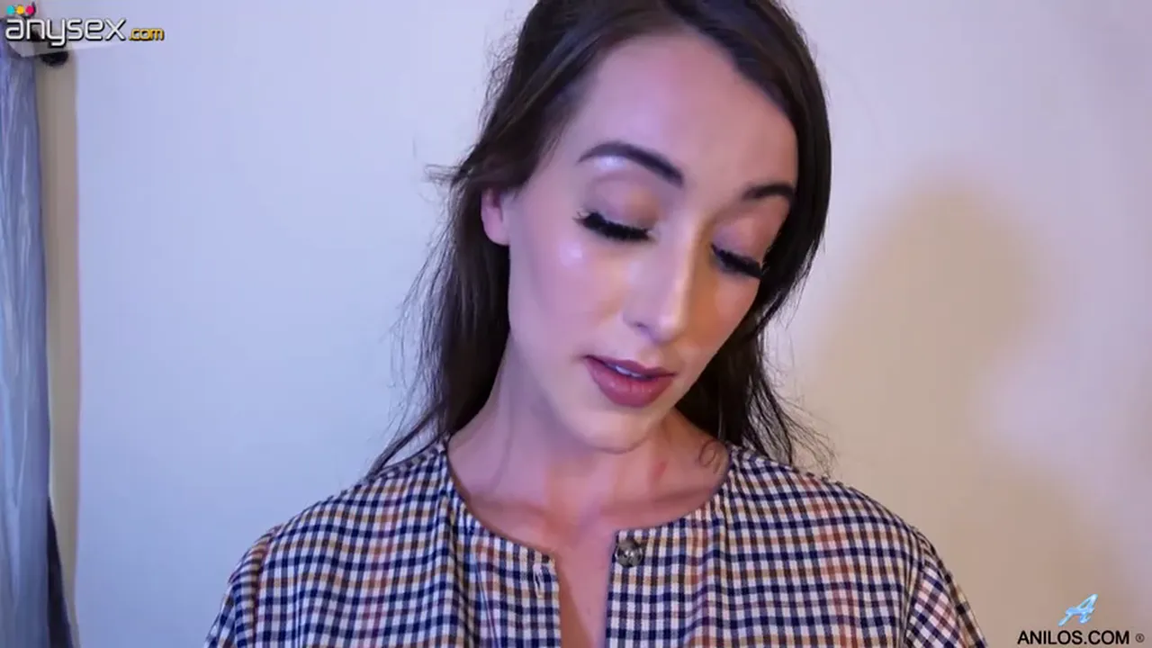 Brunette Sweet Kate moans and masturbates to orgasm in solo video