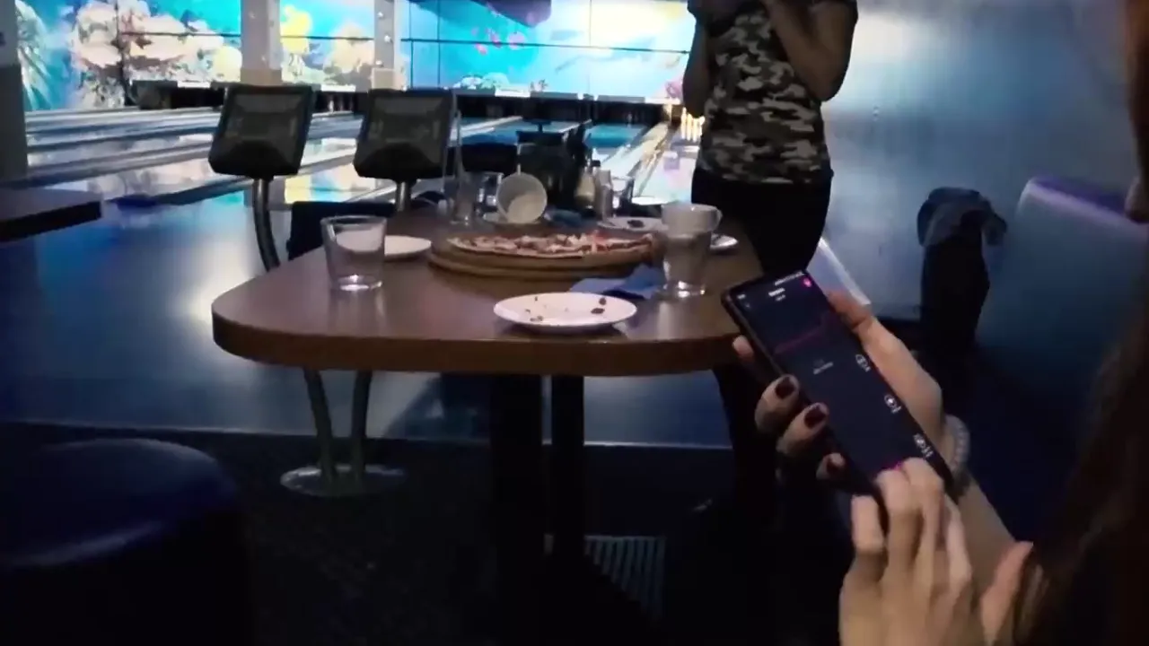 Letty Black uses a remote dildo while bowling with friends