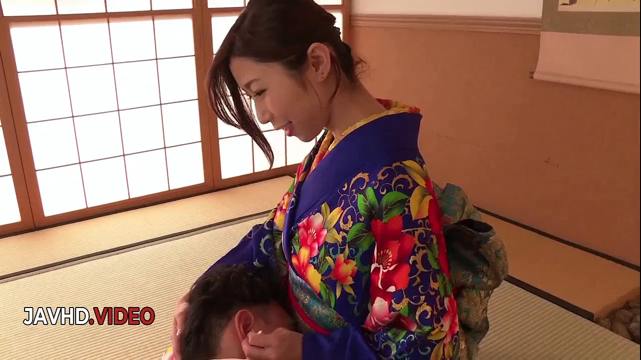 Japanese wife Ayumi Shinoda strips seductively in a kimono before giving a live webcam