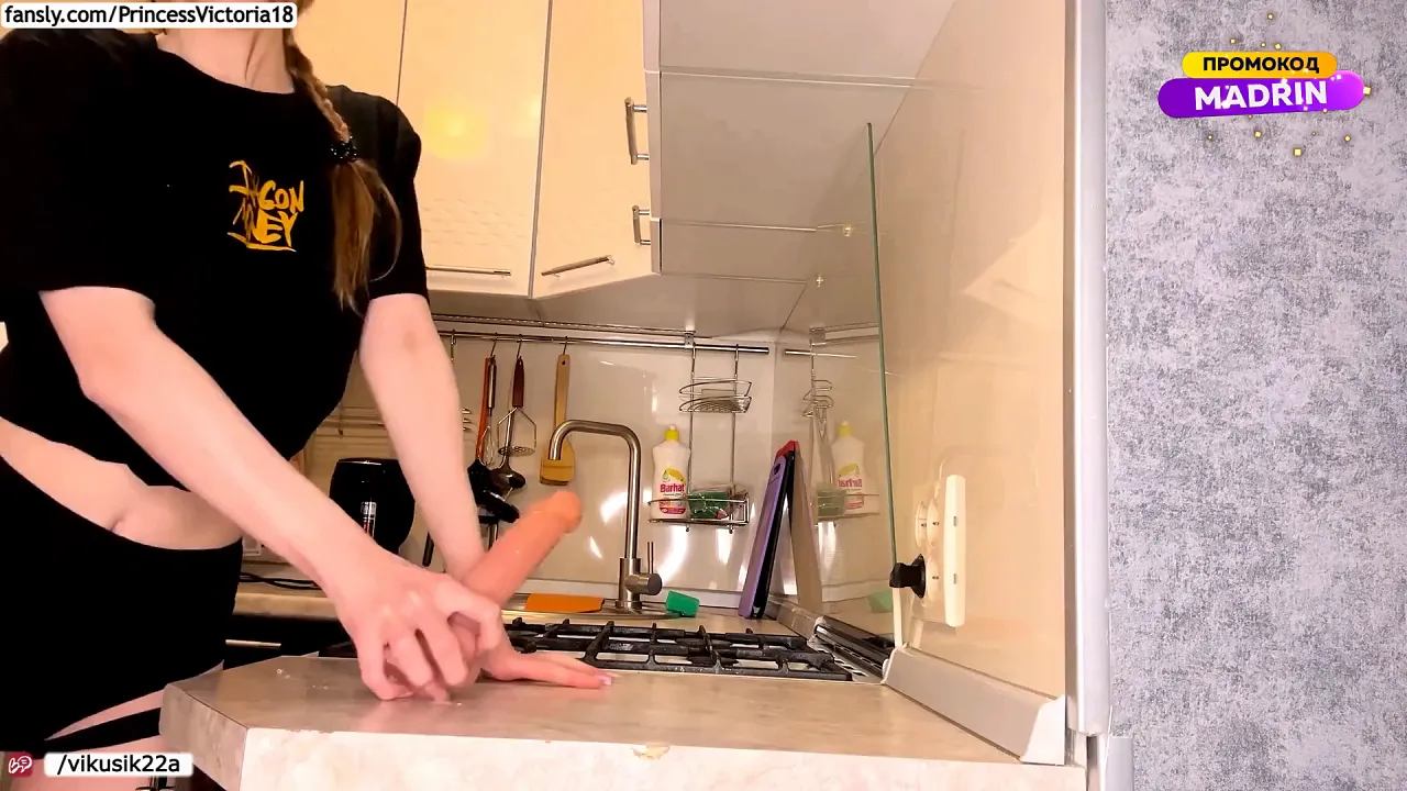 Redheaded solo babe uses a dildo and webcam while wearing fetish lingerie