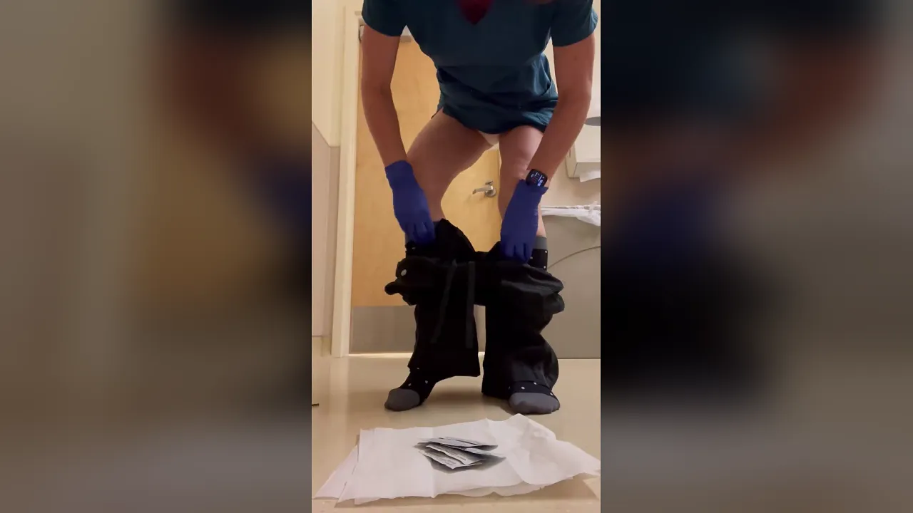 Amateur brunette nurse gets her ass fucked in a public bathroom