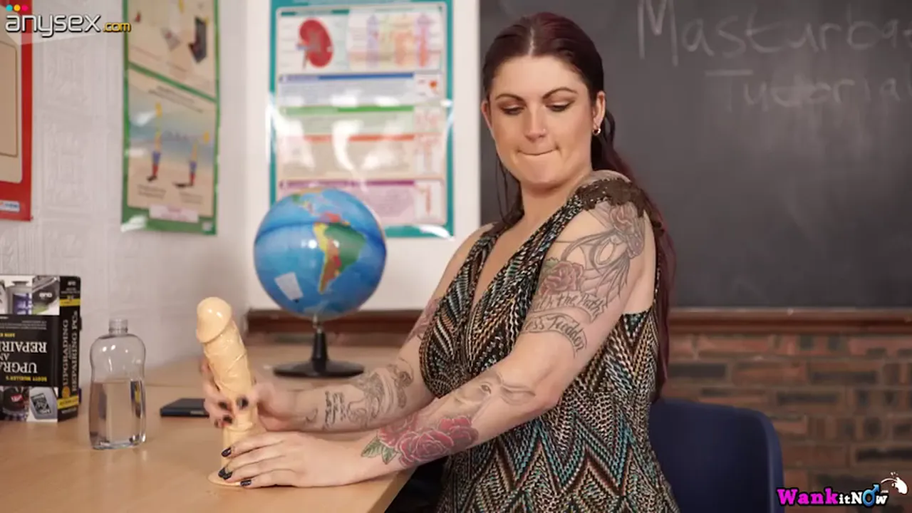 Redhead teacher Miss Selene shows off her natural big tits and masturbates with a dildo