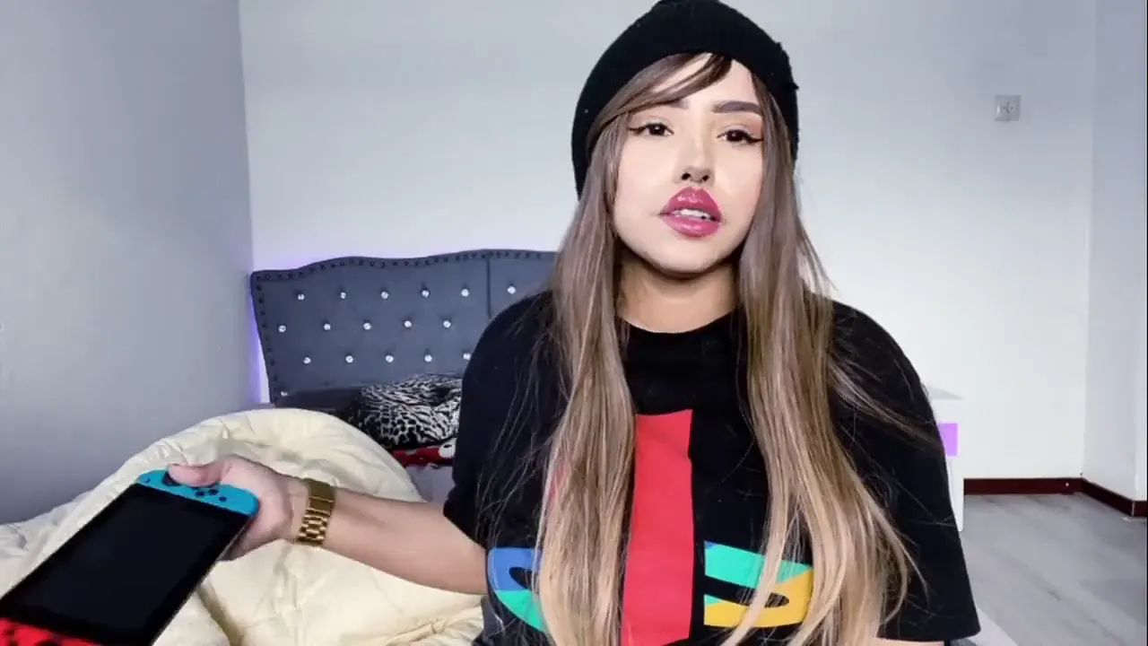 Cute blonde gamer girl and otaku masturbates solo