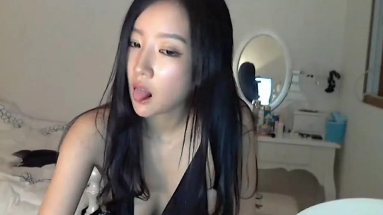 Korean babe Park Nima wanks herself while dressed as a police officer