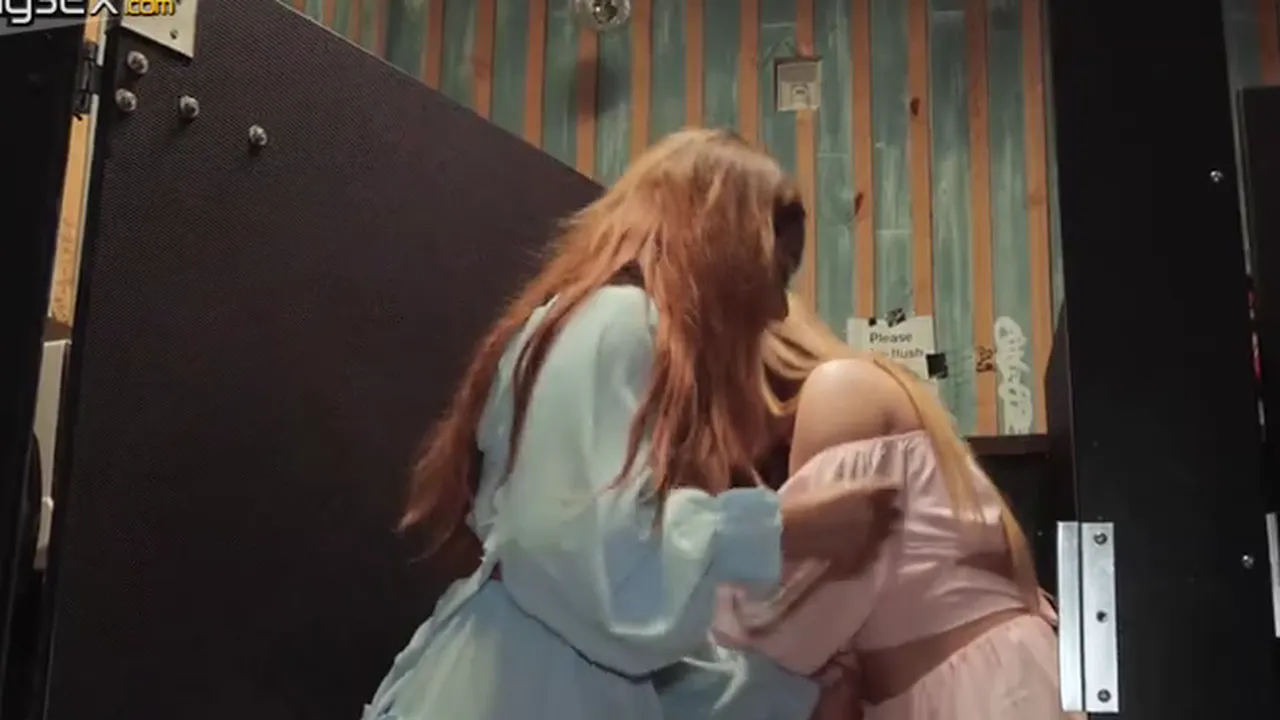 Lesbian couple Callie Black and Babi Star lick their pussies in a bar