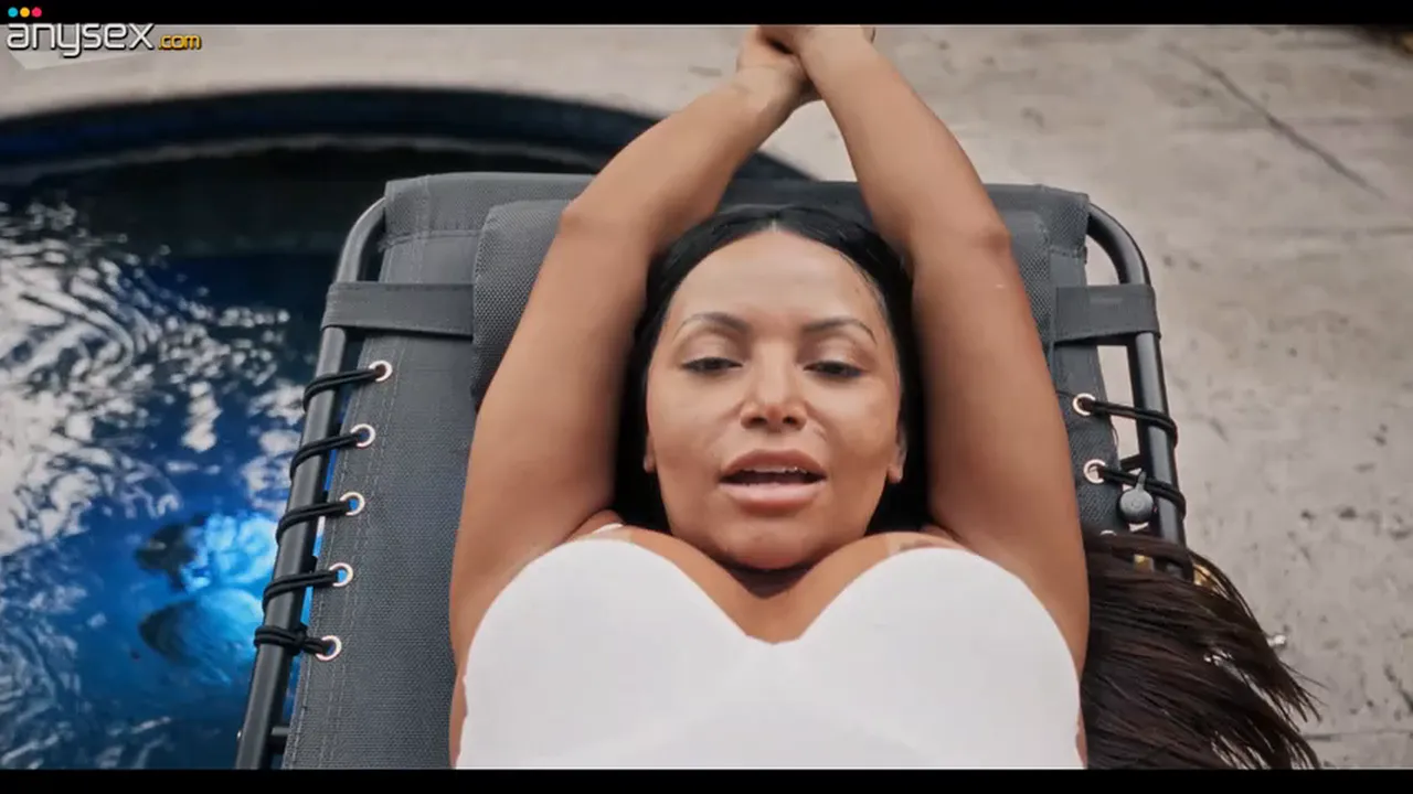 Lean Latina MILF uses butt plug for anal solo masturbation in a pool