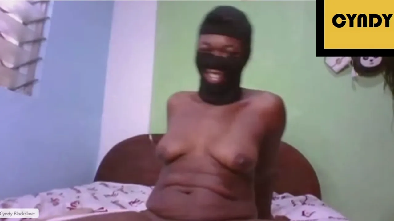 Cyndy Blackslave gets her ebony tits played with and squirts on webcam for her BDSM master