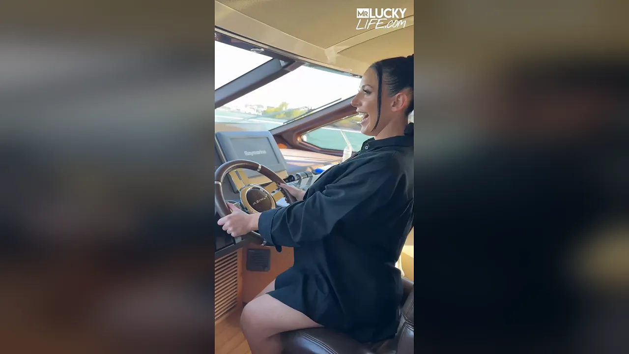 Angela White and a friend tease petite Kelsey on a Miami boat while Mr. Lucky watches