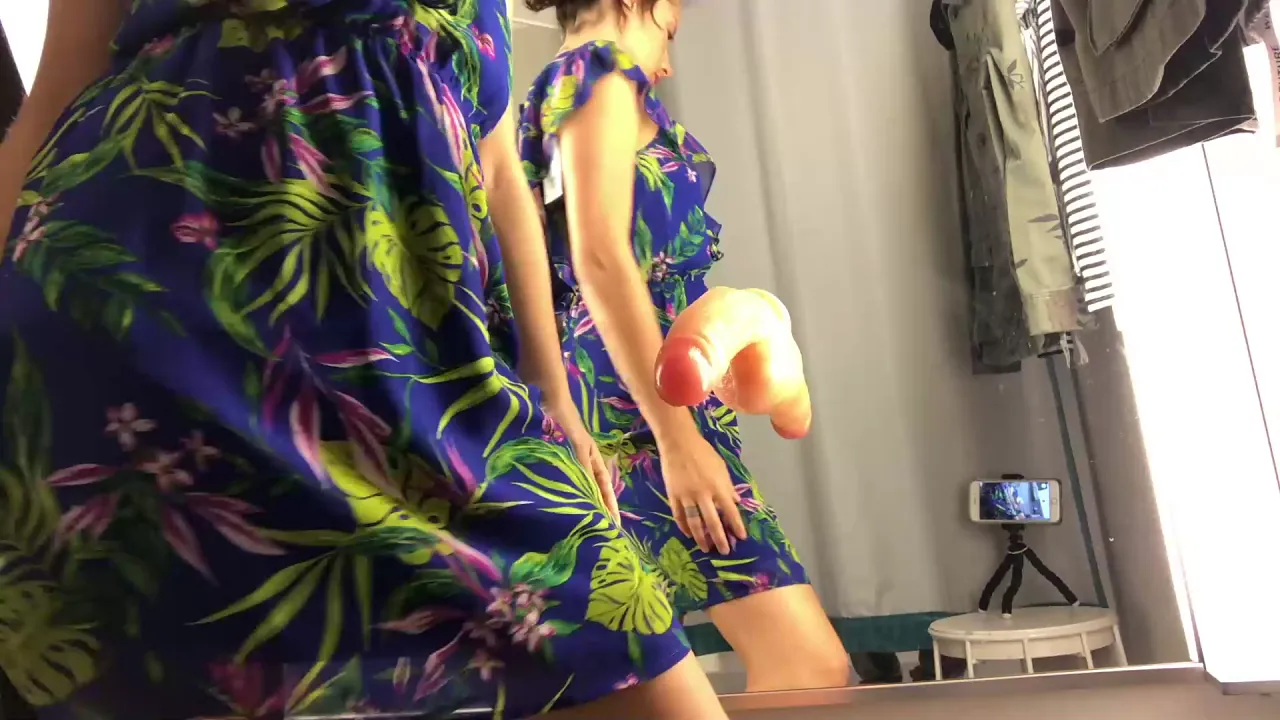 Amateur MILF uses huge vibrator to masturbate outdoors in public changing room