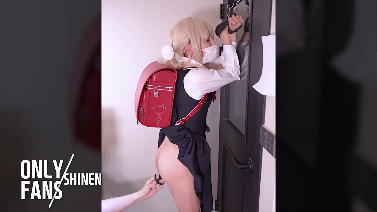 Ladyboy cosplayer in bondage and hentai play with a dildo