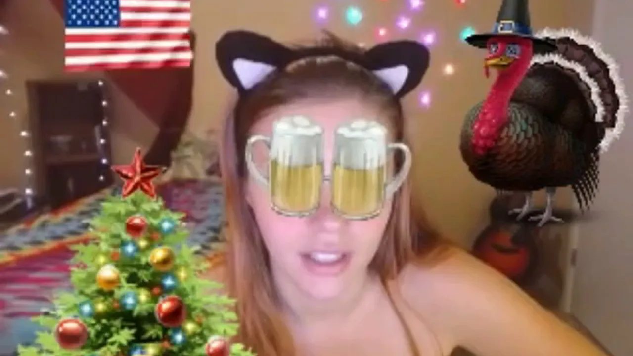 Redheaded cam girl uses dual vibrators in live fetish show