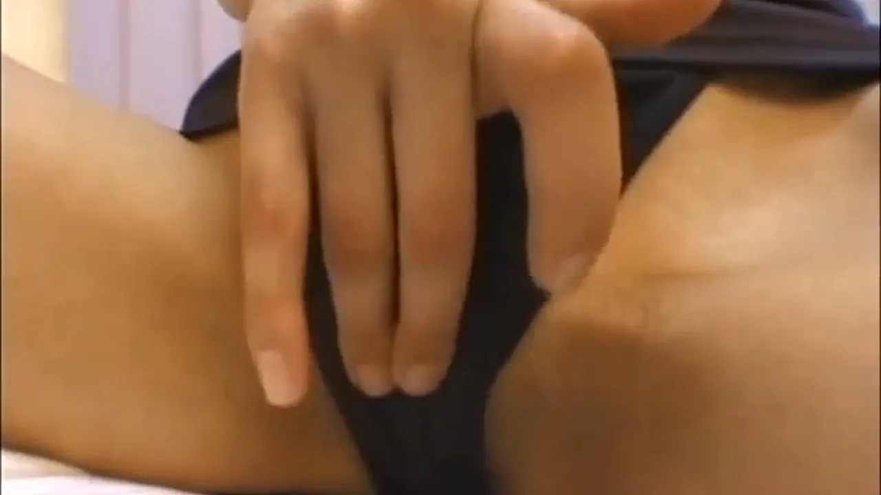 Japanese MILF fingers and toys her pussy in a solo masturbation video