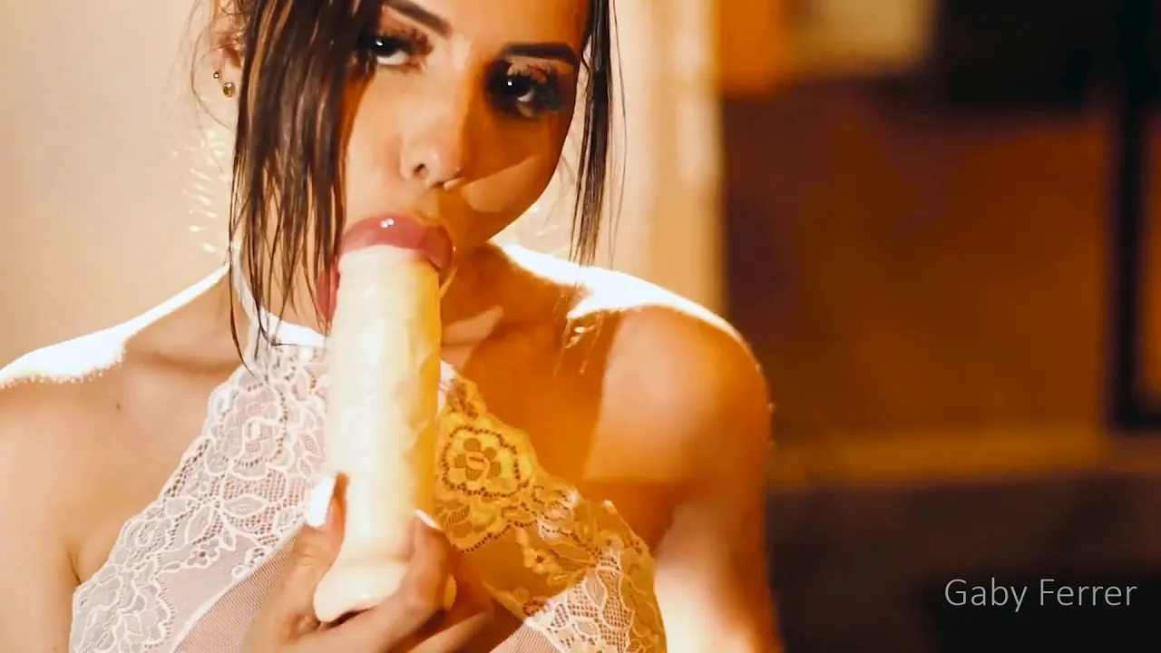 Petite Latina Gaby Ferrer masturbates in babydoll lingerie with a big dildo