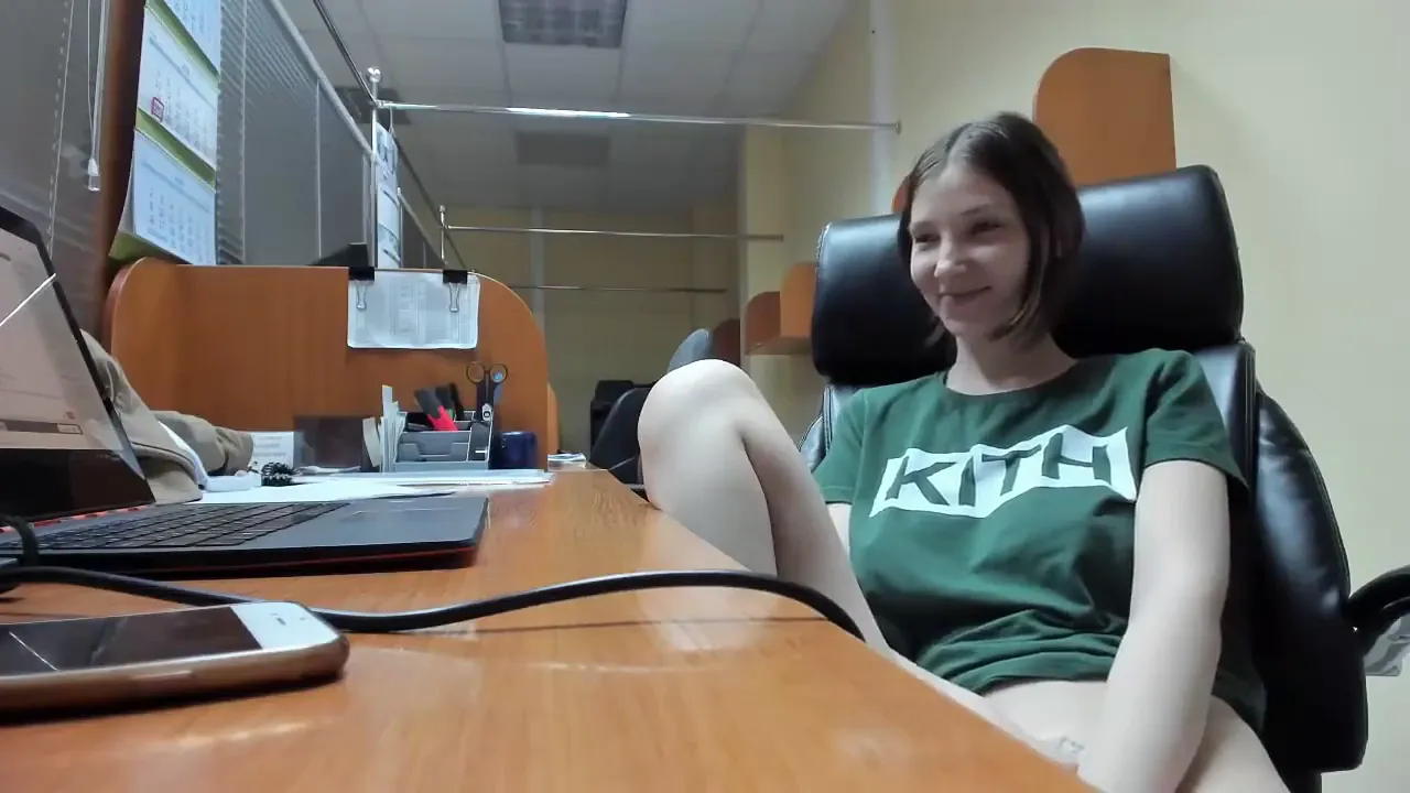 Brunette flashes big natural tits and masturbates with a vibrator in the public library