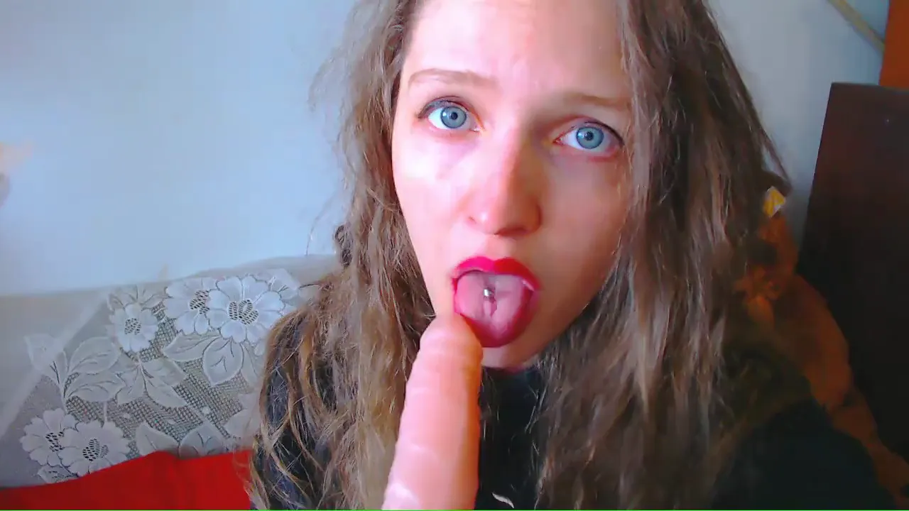 Russian redheaded webcam model gives Rock a blowjob while using toys