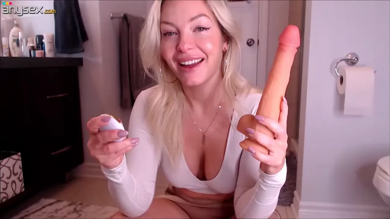 Curvy blonde MILF juggles a huge dildo in her nasty bathroom solo