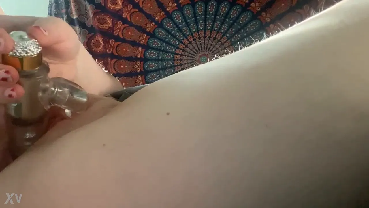 Cute girl wanks her smooth pussy with a vibrator