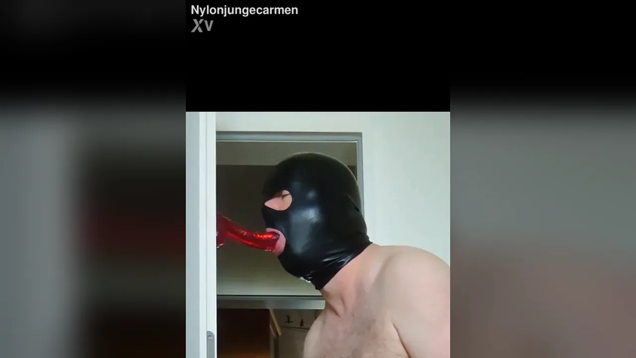 German amateur girl sucks a red dildo