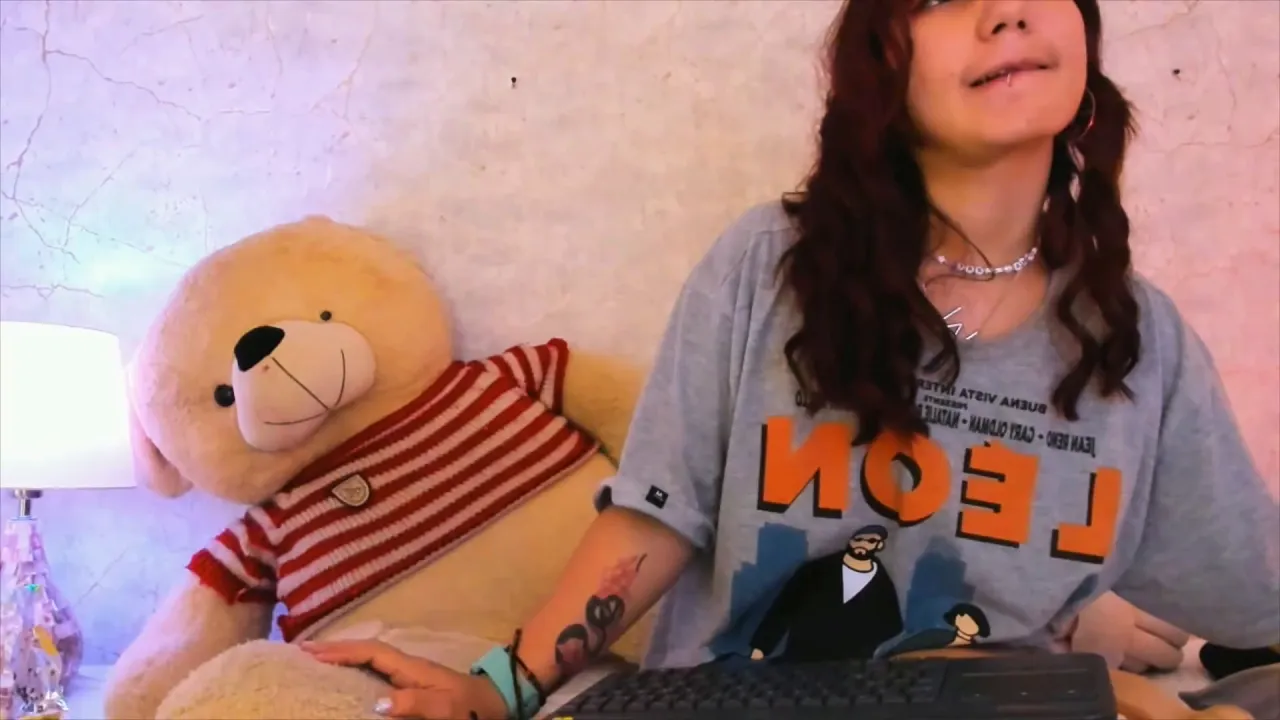 Red Waifu webcam model shows off her big Latina ass and small tits