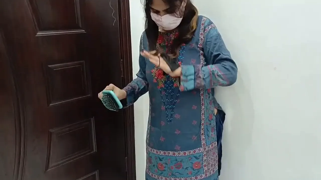 Brunette solo masturbation with a medical mask