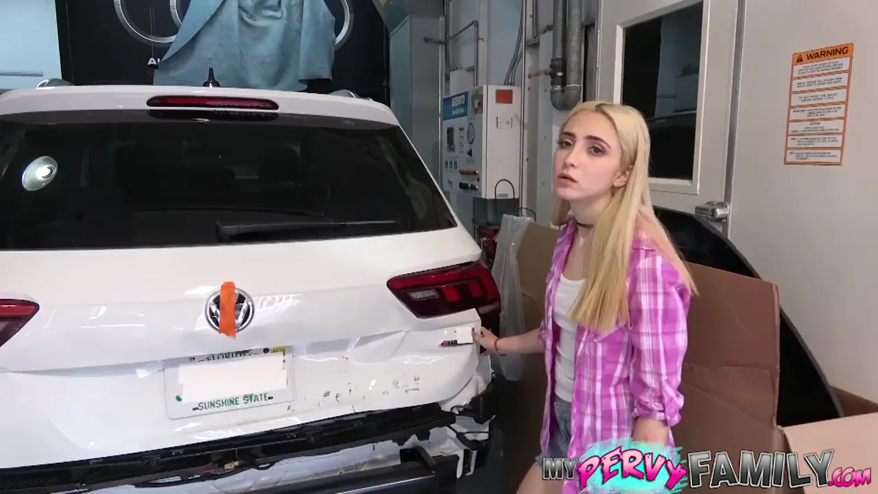 Jane Wilde blows Levi Cash's big cock before taking his facial in a car garage