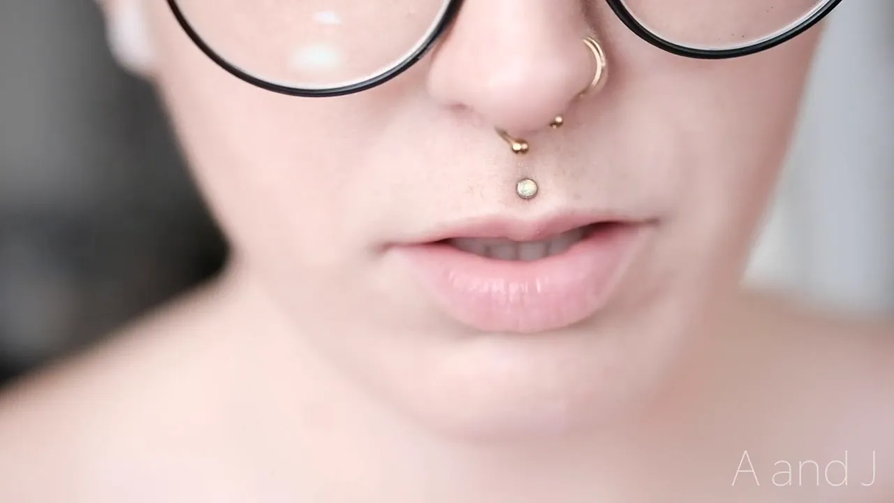 Solo female masturbates with piercings and loud asmr moaning