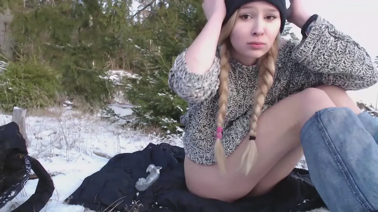 Young solo girl masturbates with toys in public while snow falls